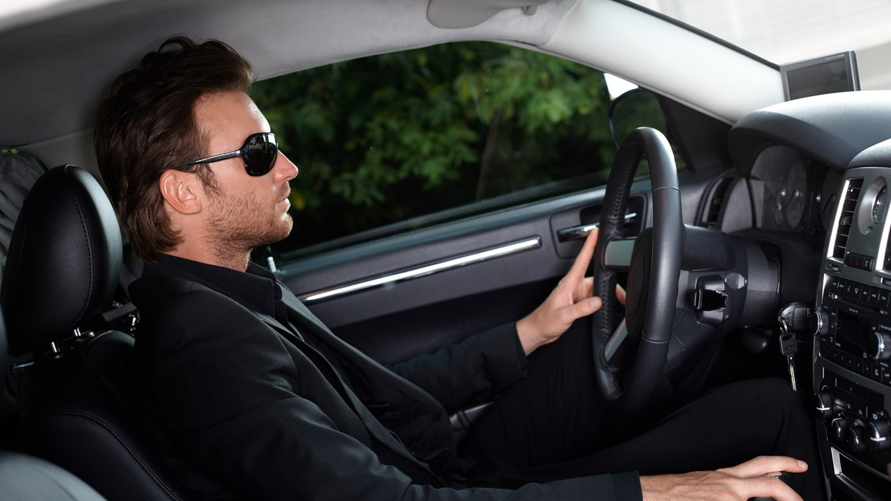 Man driving  a sports car - Gap Insurance